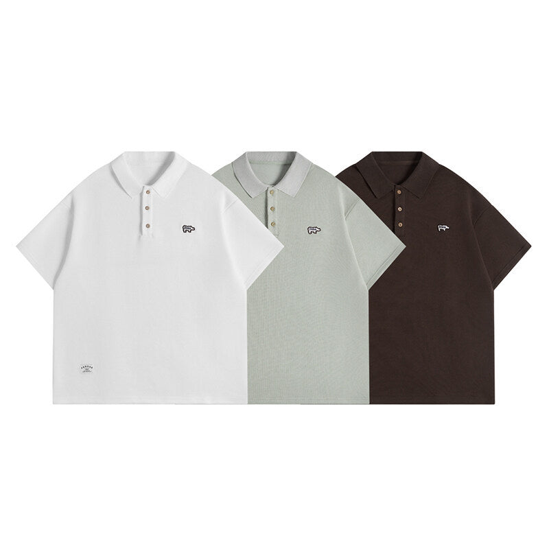 Minimally embroidered polo shirt for men with loose collar and short sleeves
