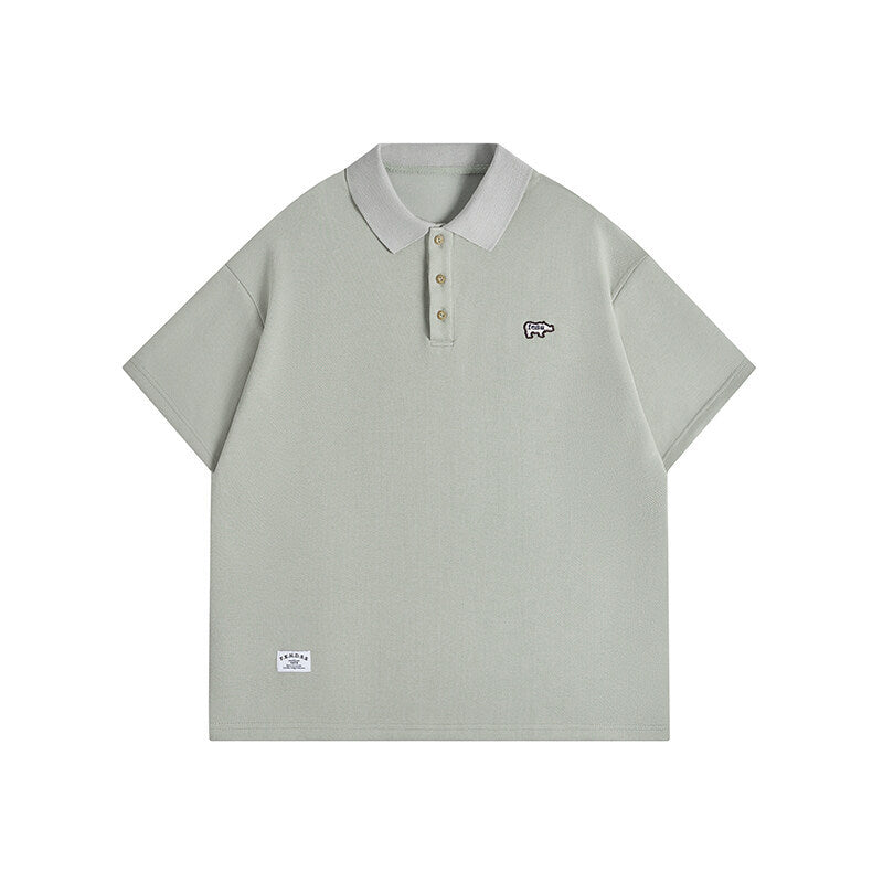 Minimally embroidered polo shirt for men with loose collar and short sleeves