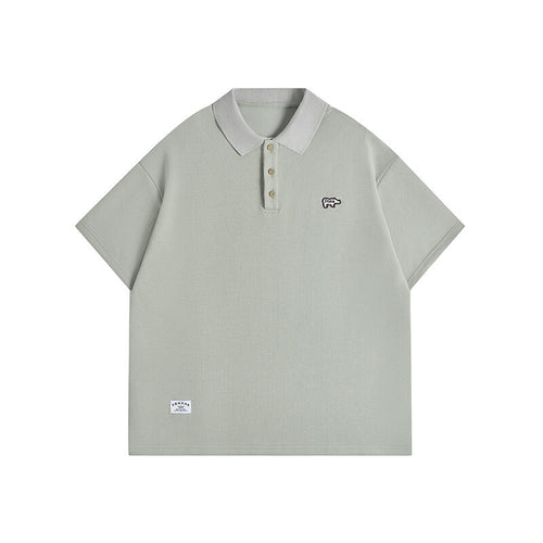 Minimally embroidered polo shirt for men with loose collar and short sleeves