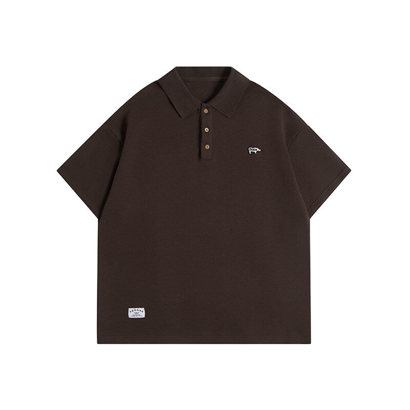 Minimally embroidered polo shirt for men with loose collar and short sleeves