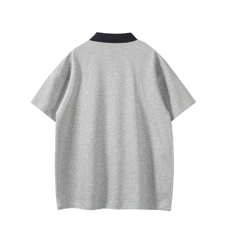 Color blocked polo shirt with loose embroidered collar and short sleeves