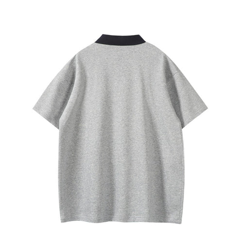 Color blocked polo shirt with loose embroidered collar and short sleeves